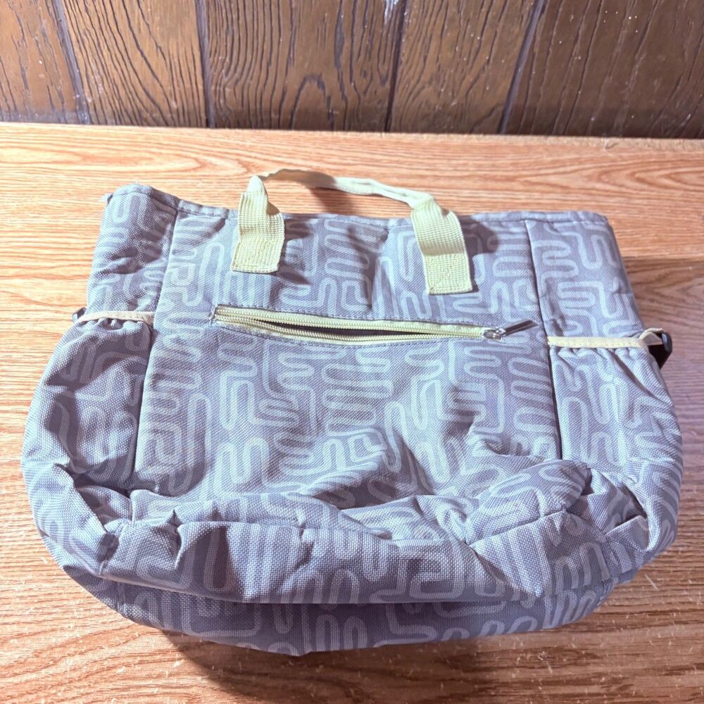 Light Blue Canvas Tote Bag Geometric Pattern Light Yellow Handles Over Shoulder
